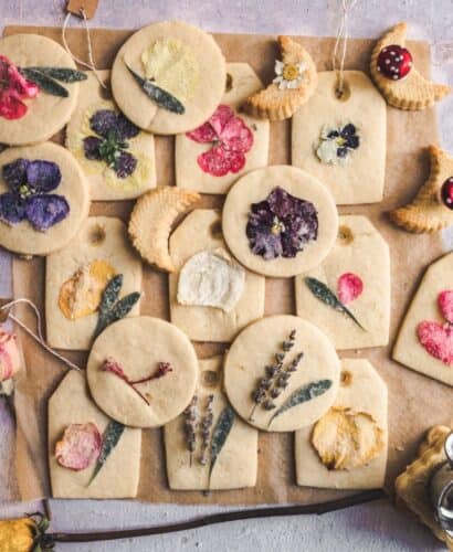 overhead shot of cookies decorated with edible flowers