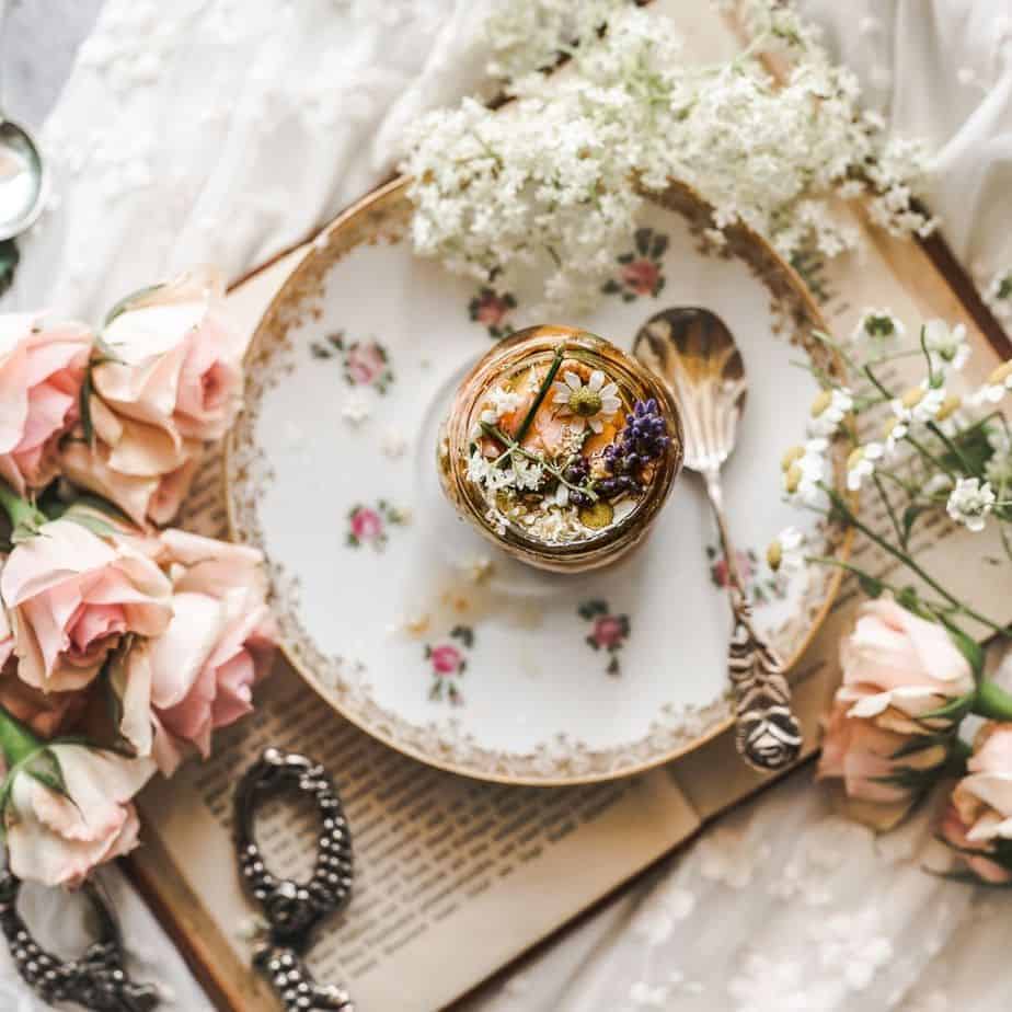 overhead shot looking into a jar of floral infused honey cover image