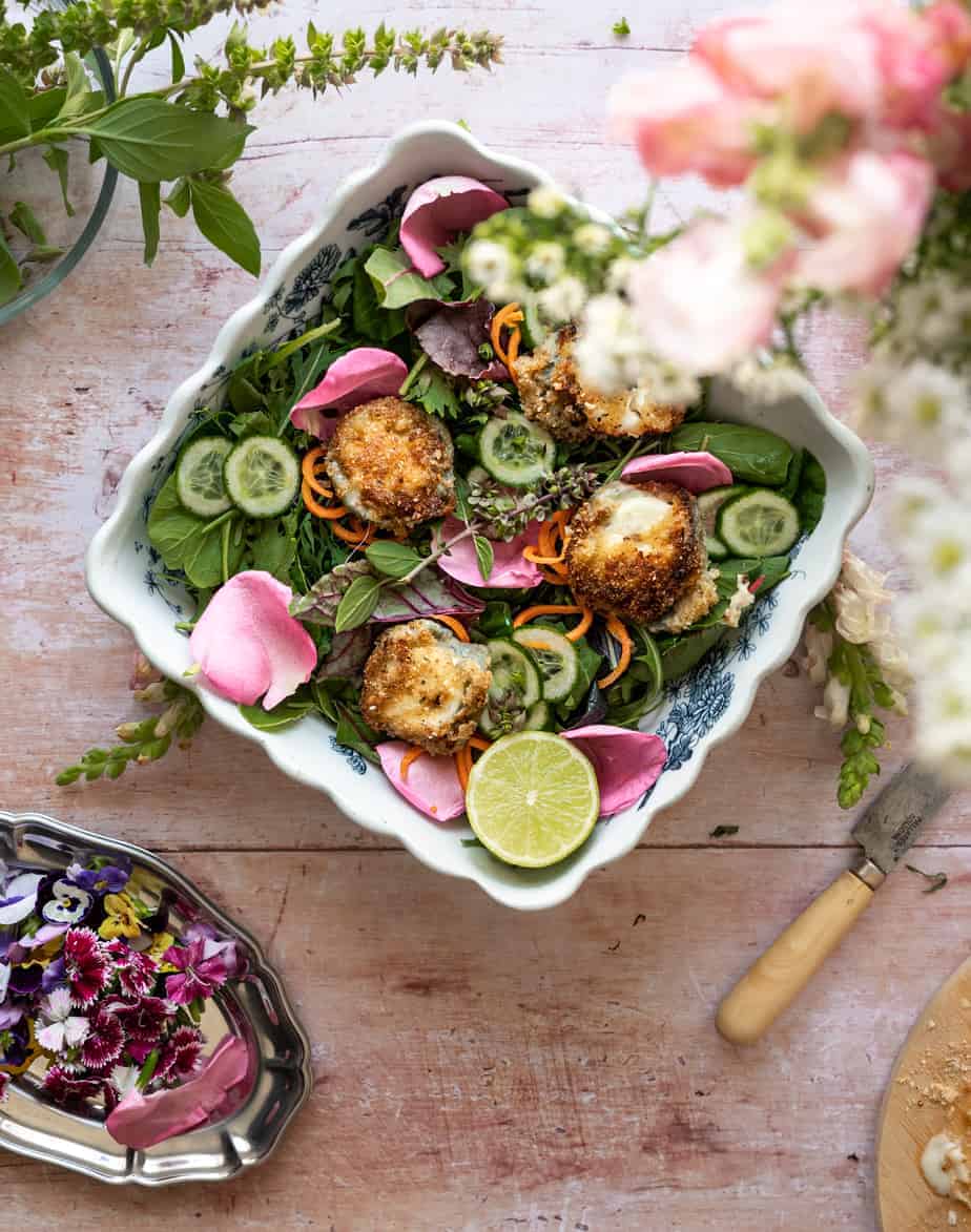vibrant edible flower salad with fried goat cheese