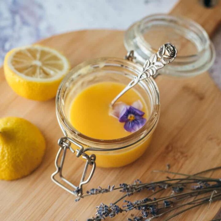 lavender lemon curd in a jar with pansy