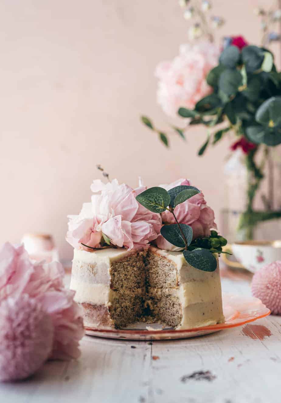 close up photo of cake with slice cut out to show layers inside