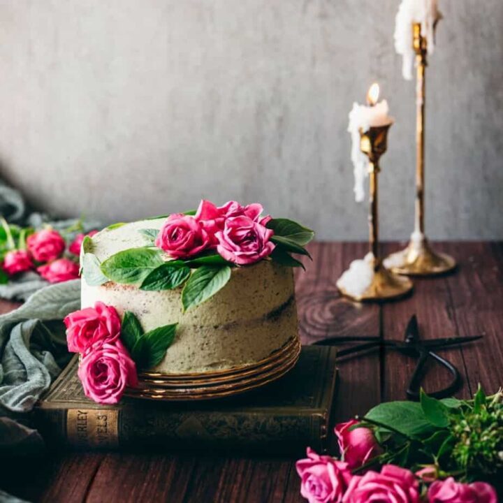 photo of cake with bright green mint basil buttercream with pink roses