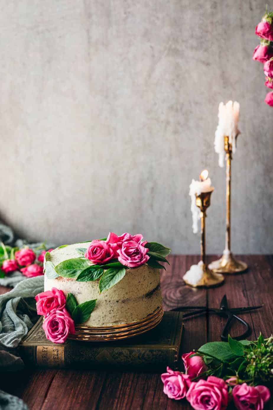 photo of cake with bright green mint basil buttercream with pink roses