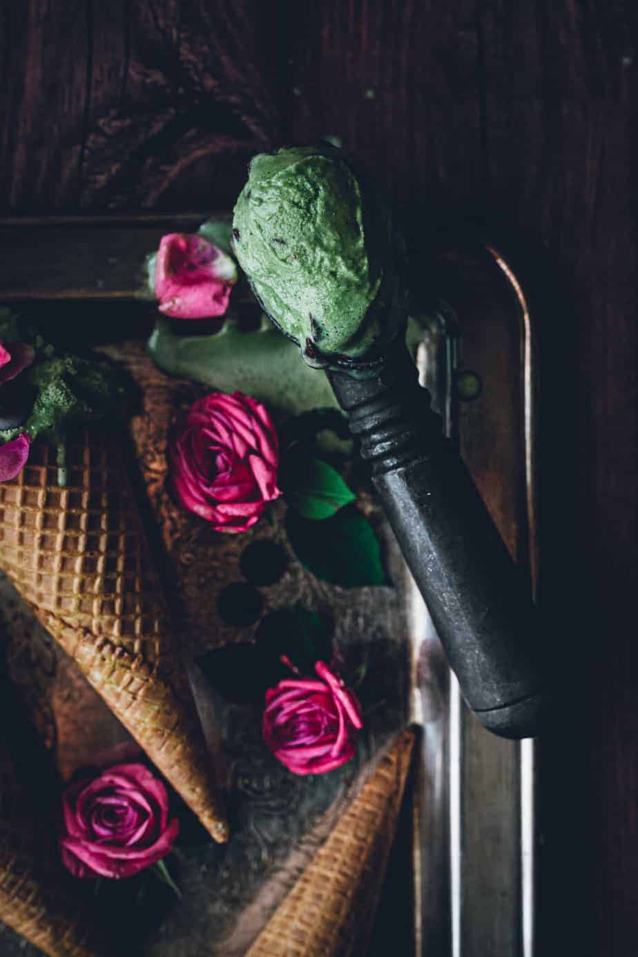 vintage ice cream scoop with vibrant green mint chocolate ice cream