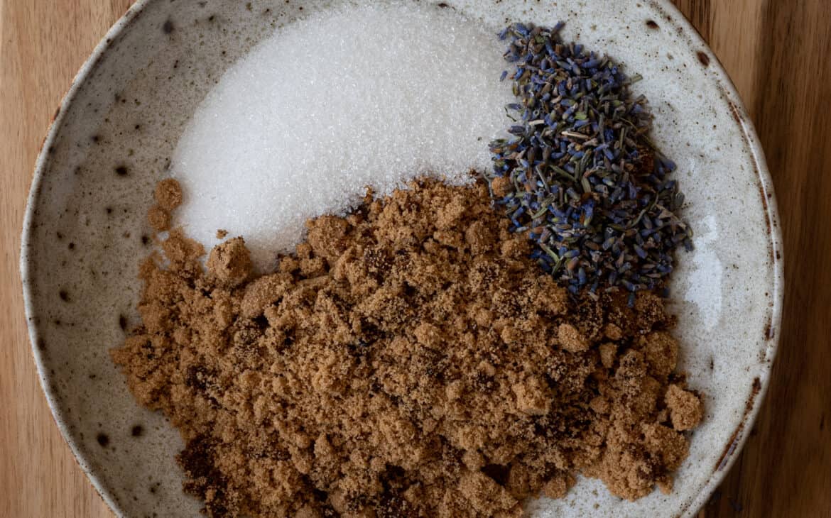 bowl of white sugar, brown sugar and lavender to be combined