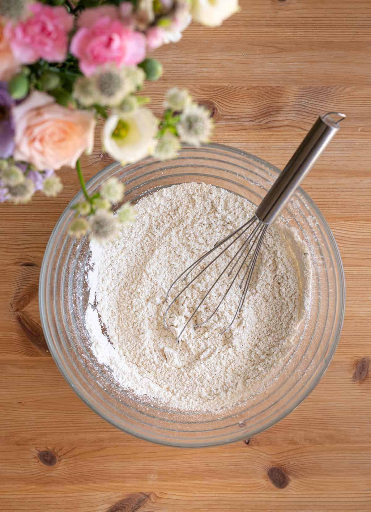 Bowl of flour with whisk