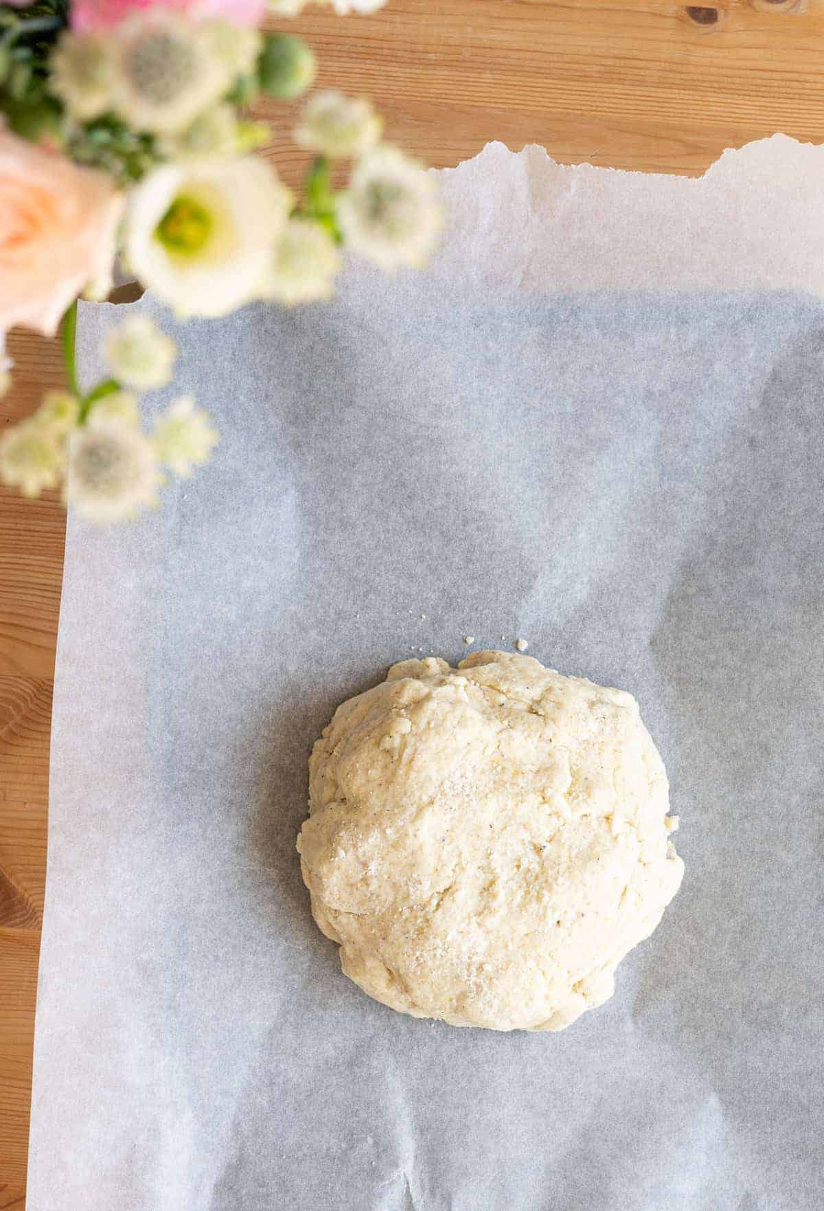 Dough ball on parchment paper