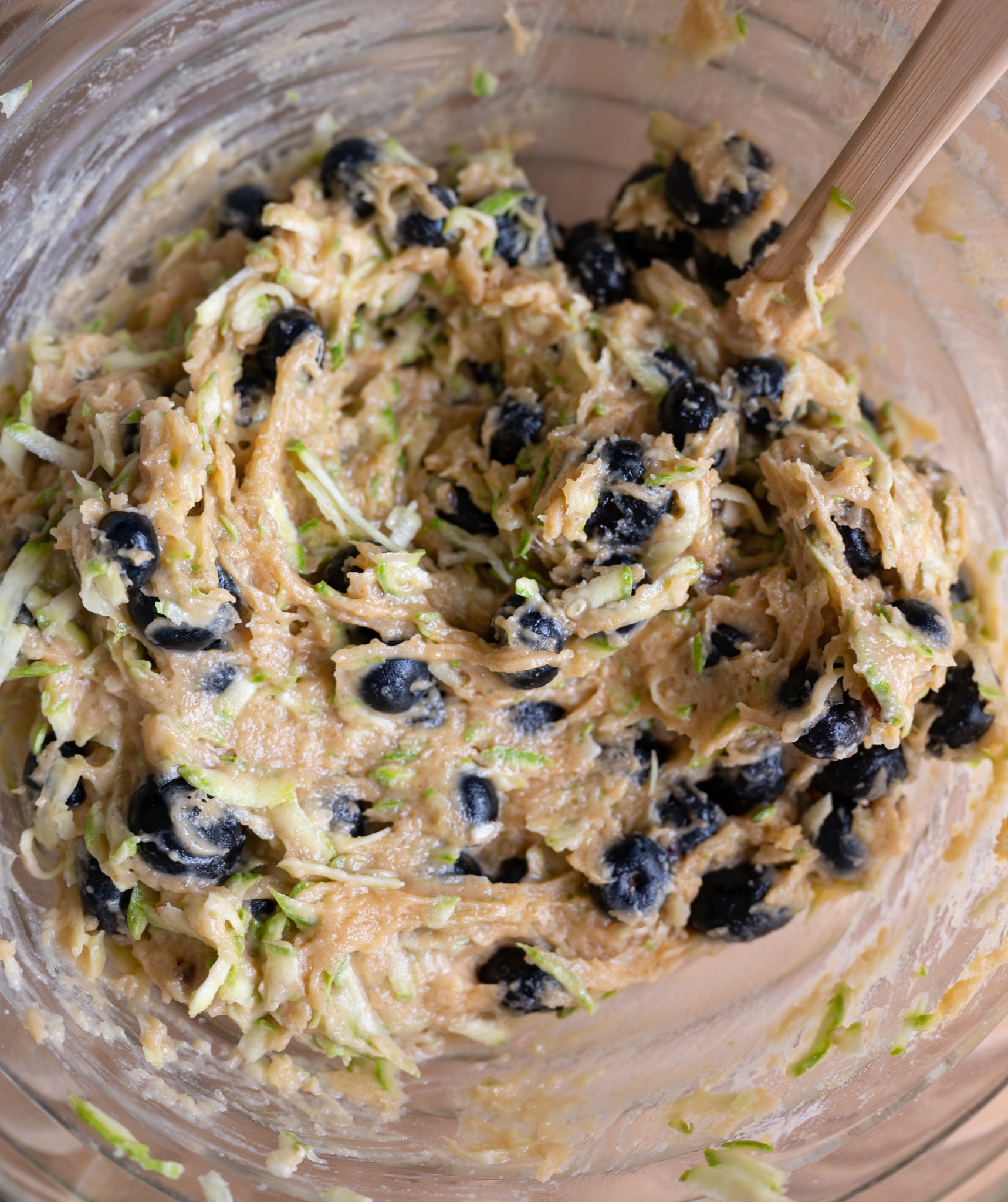 overhead shot of blueberry zucchini bread batter in bowl