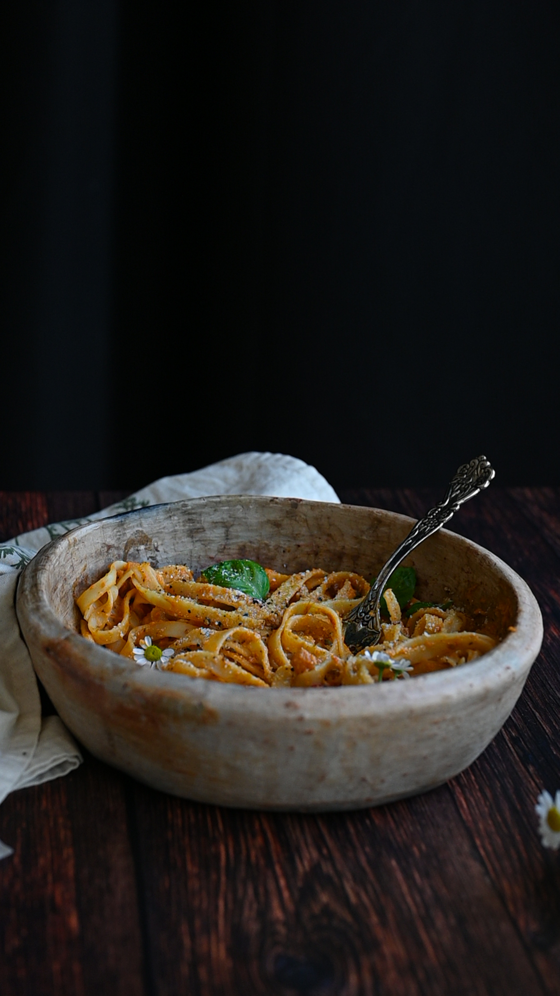 zucchin spaghetti sauce over pasta in a bowl