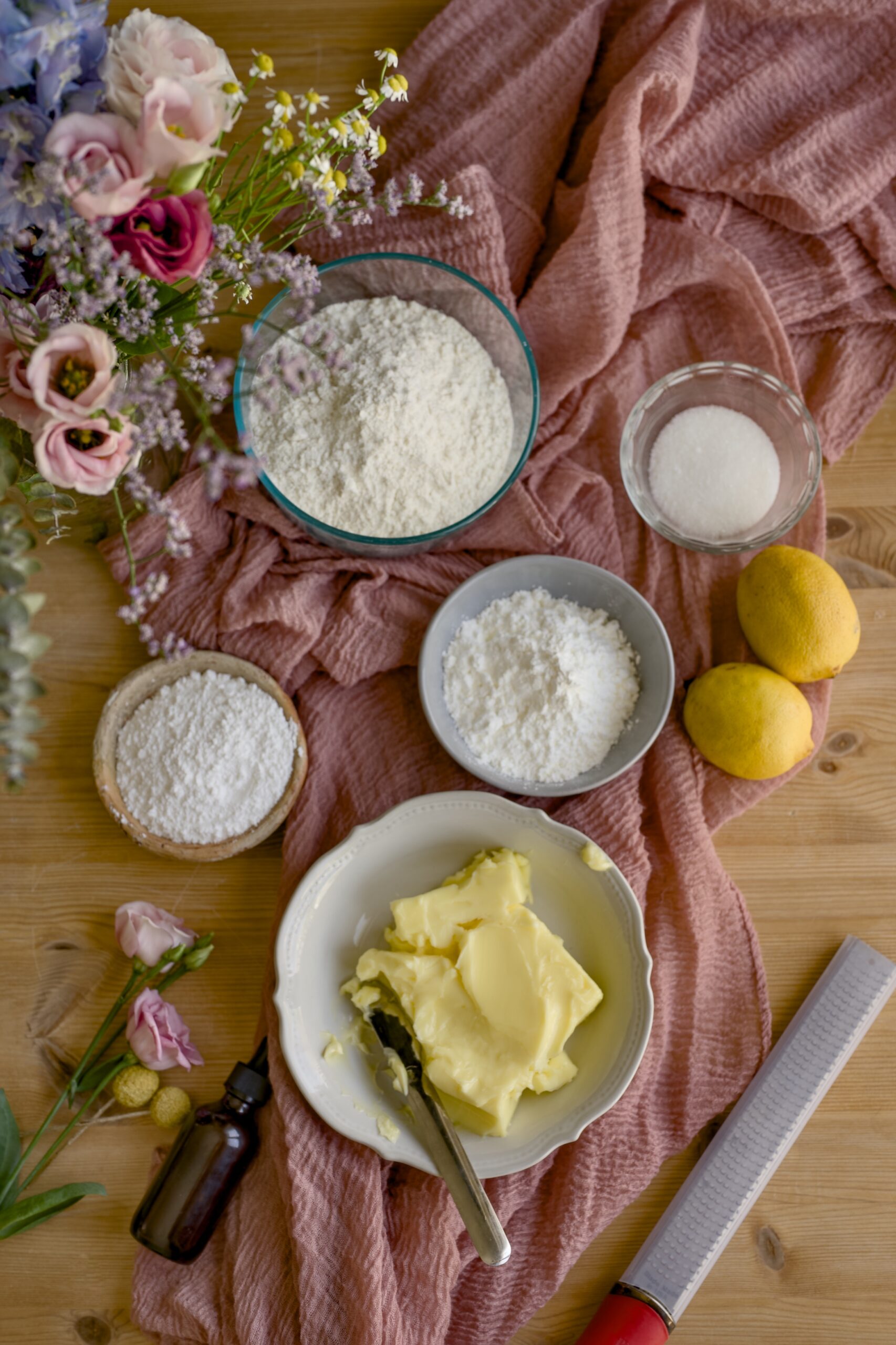 overhead image of bowls of ingredients for lavender earl grey shortbread cookies