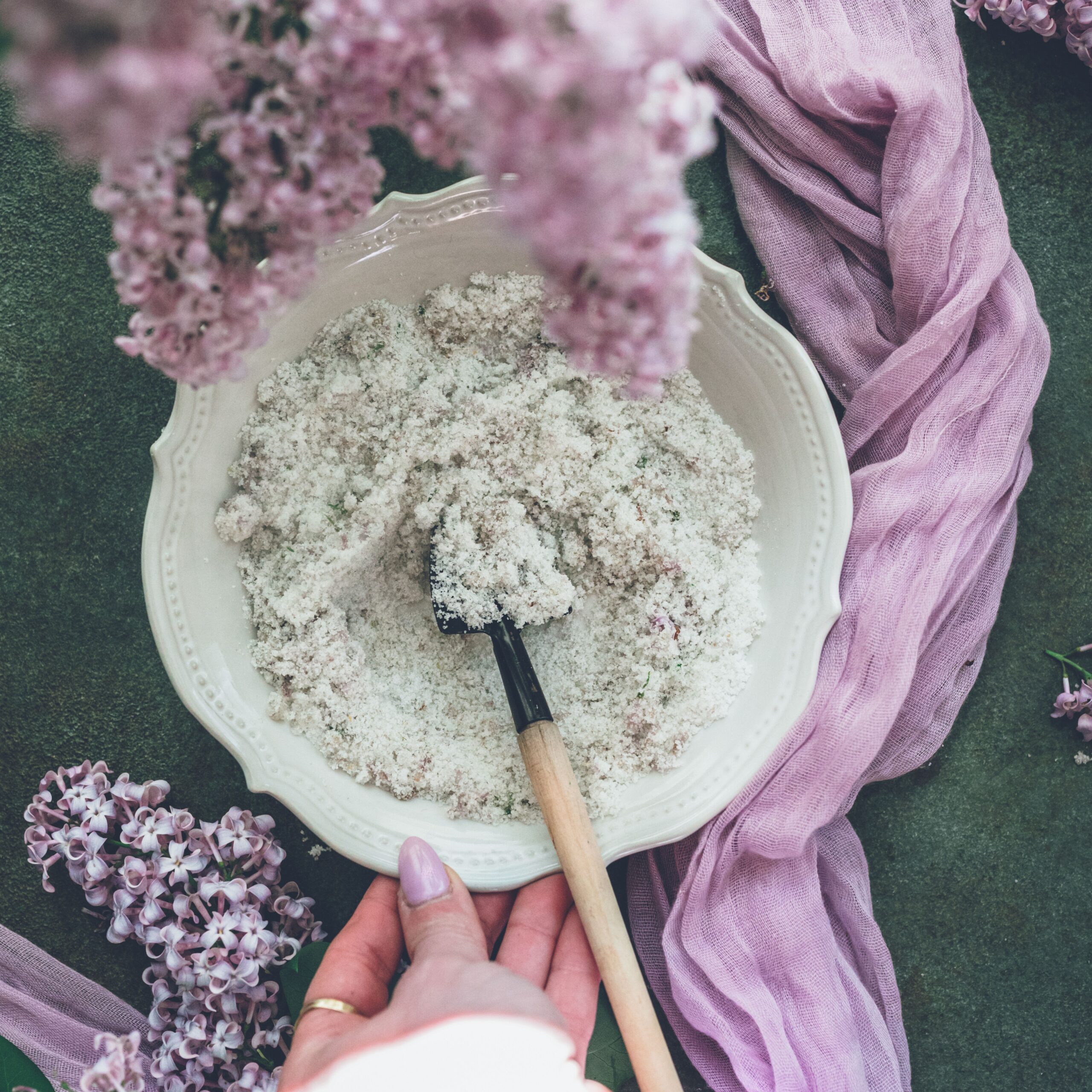 Bowl of sugar with lilac flowers